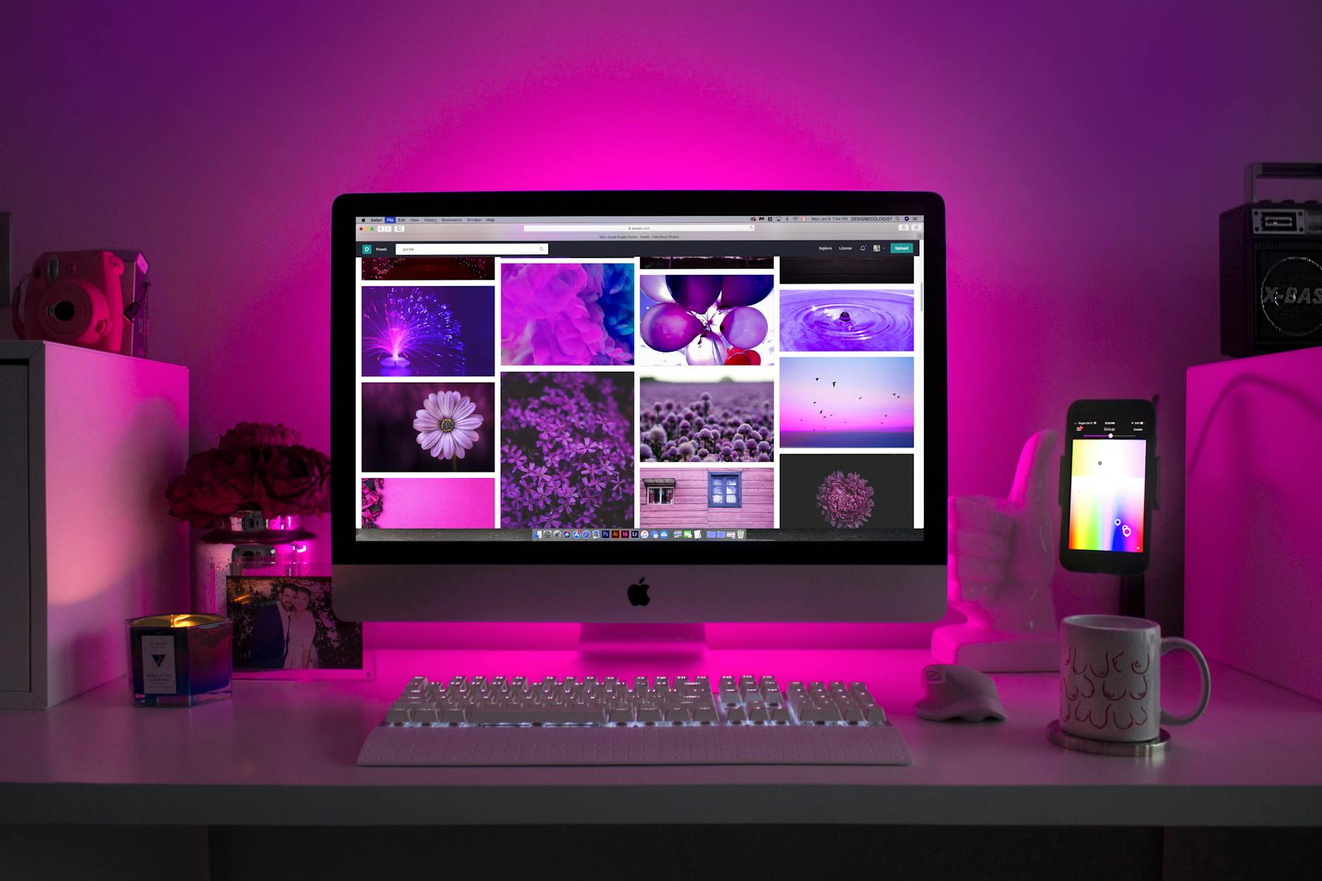 Image of a Desktop Monitor with Pink Background lights.