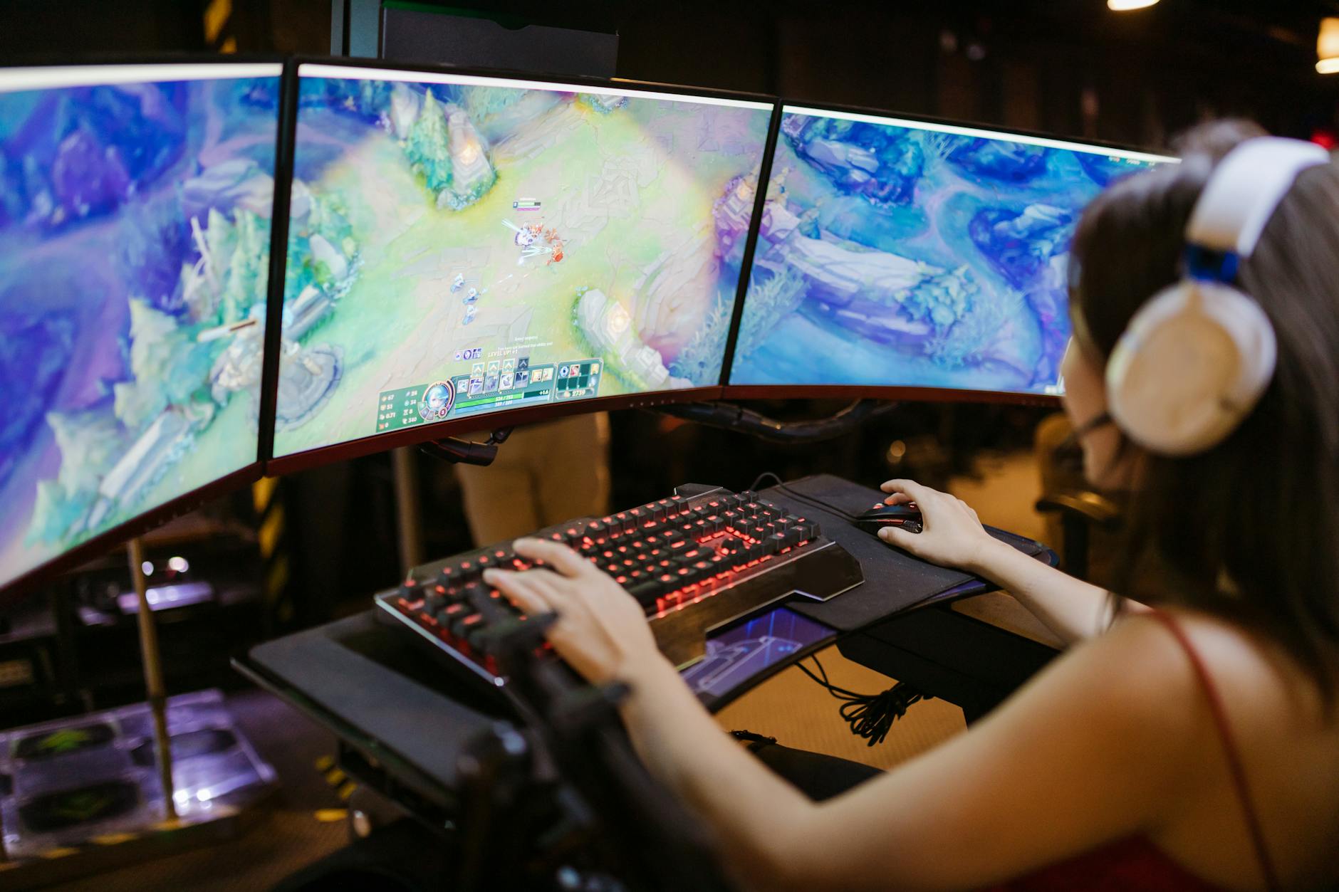 Image of a woman playing game in Gaming PC.